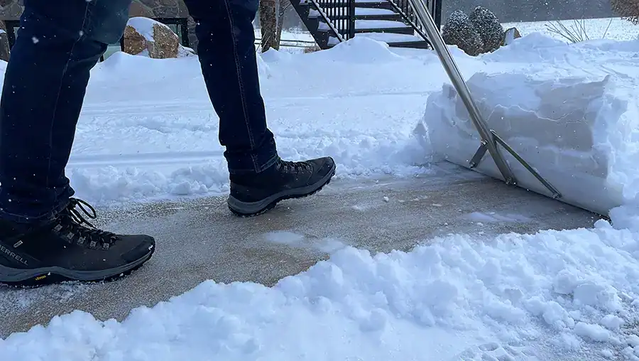 person shoveling snow